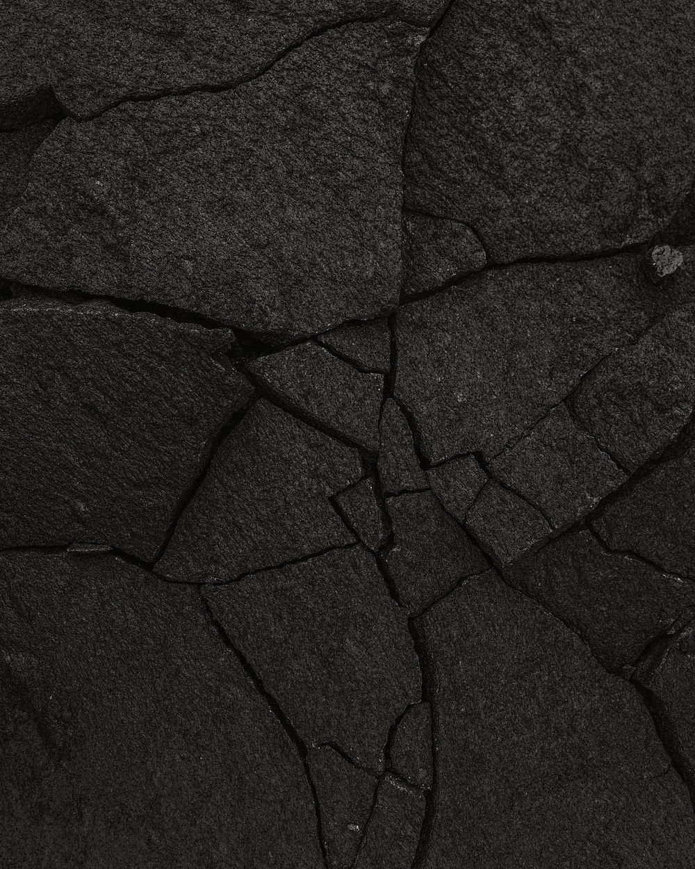 Cracked black concrete texture background