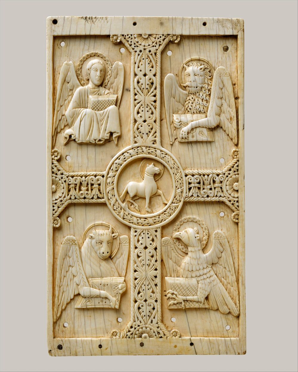 Plaque with Agnus Dei on a Cross between Emblems of the Four Evangelists