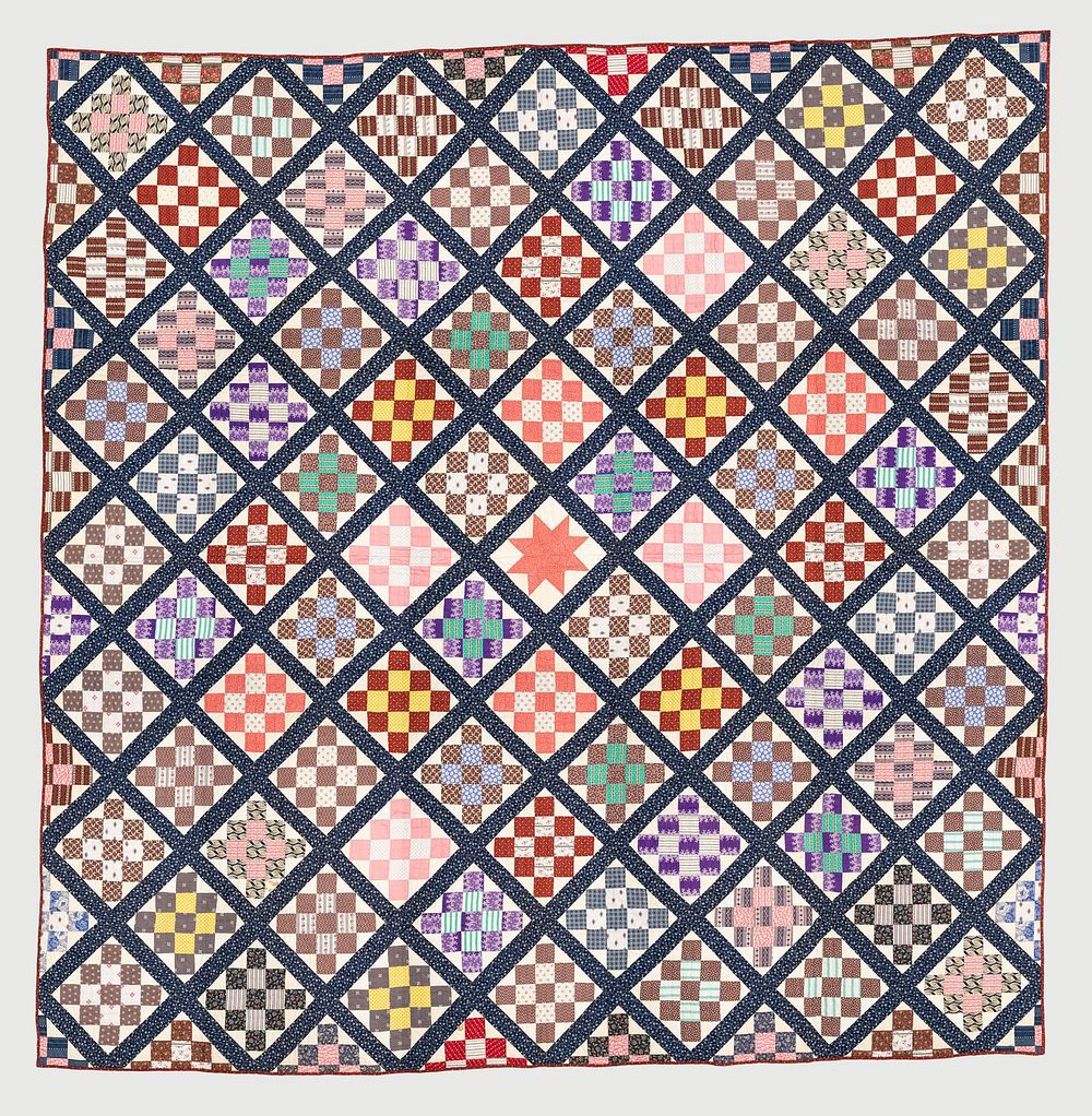 Thirteen-patch block quilt with Japanesque backing fabric