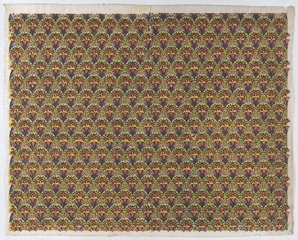 Sheet with overall fan design in yellow, green, and red