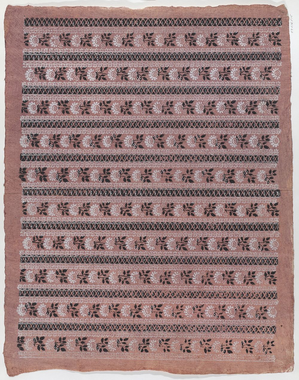 Sheet with ten borders with floral patterns on pale pink background