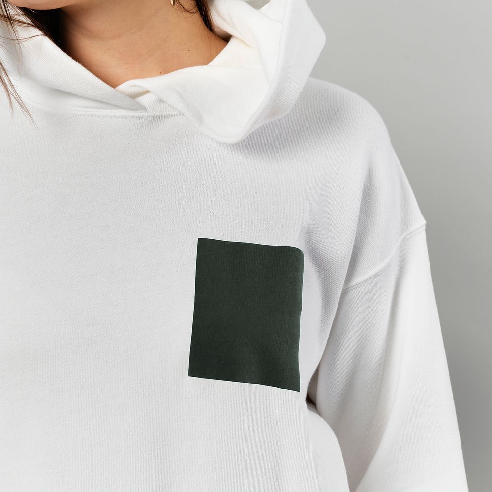 White hoodie with green pocket