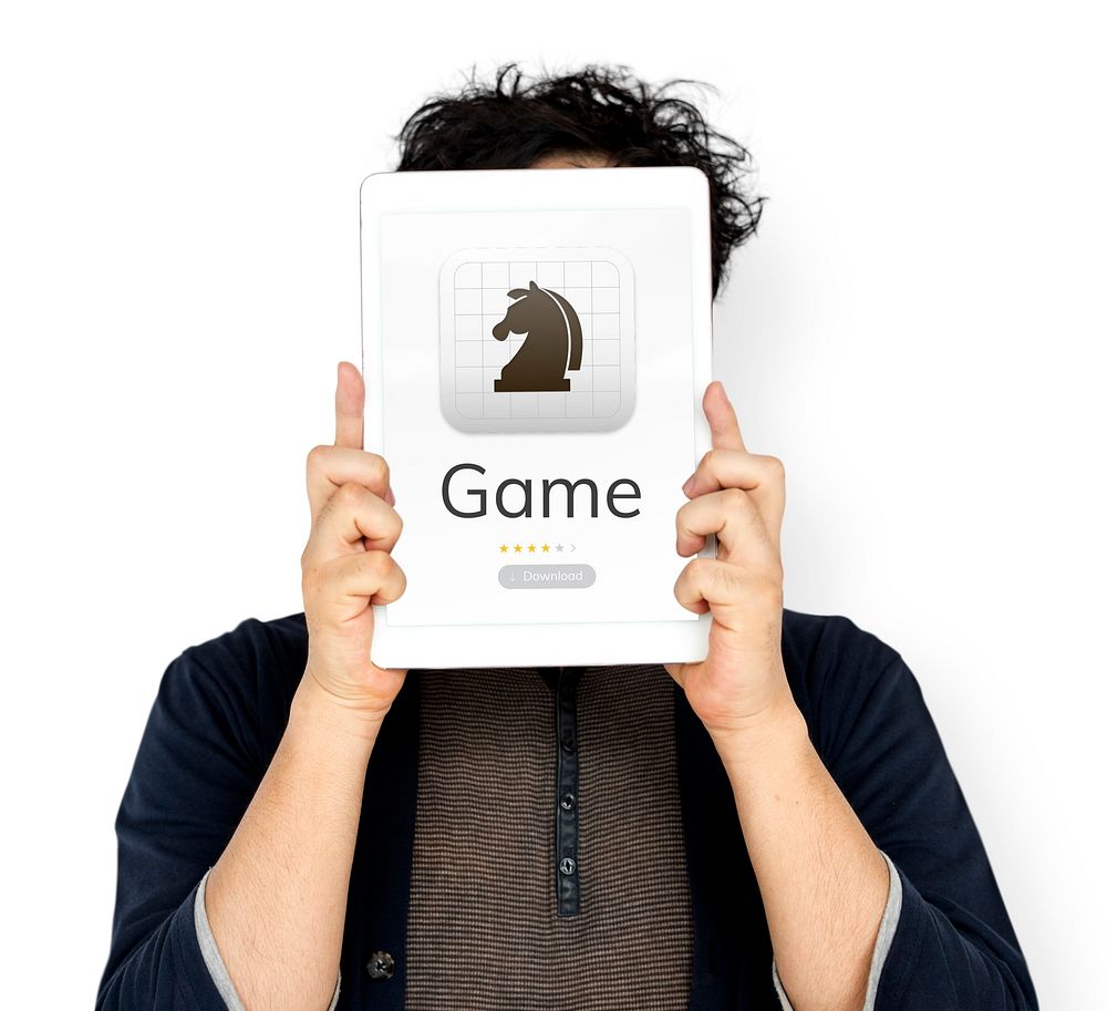 Man holding tablet cover his face about download chess game