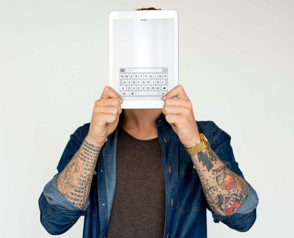 Hands holding network graphic overlay digital device covering face