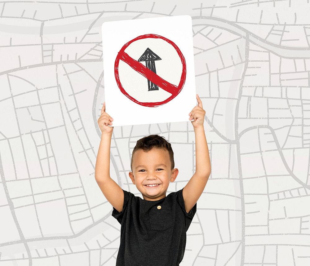 Young boy holding network graphic overlay banner