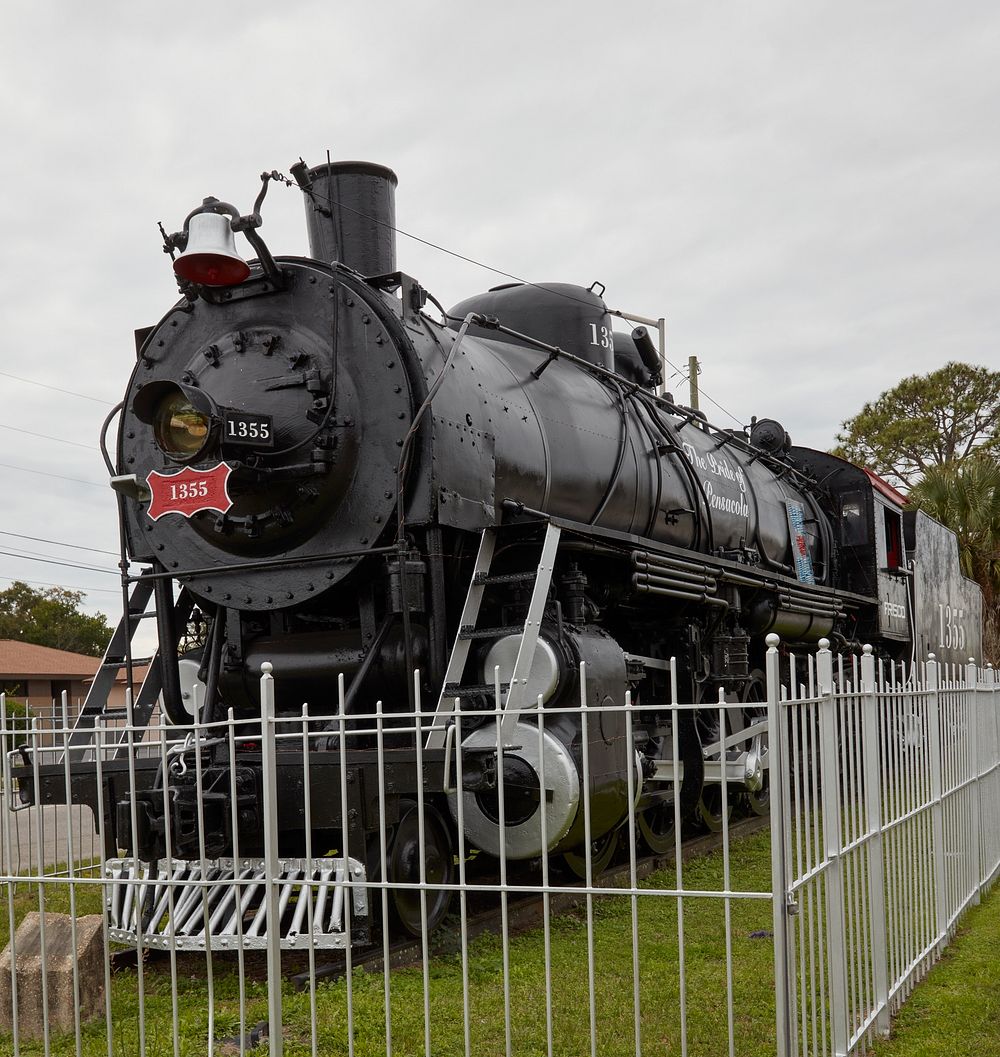                         The Pride of Pensacola locomotive, known to train buffs as the 1355, is an 84-foot long steam…