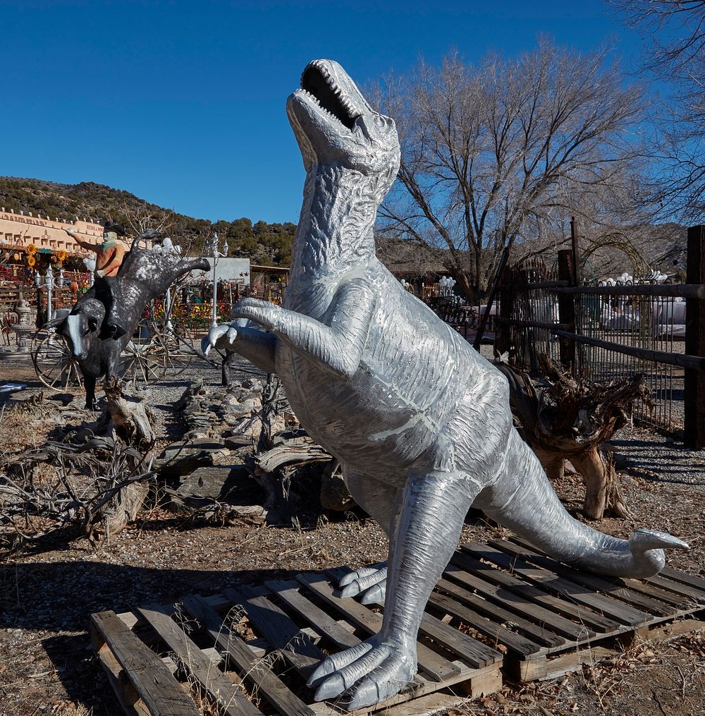                         Metal-art dinosaur displayed outside the Casa Cristal Pottery home-and-garden roadside store near…