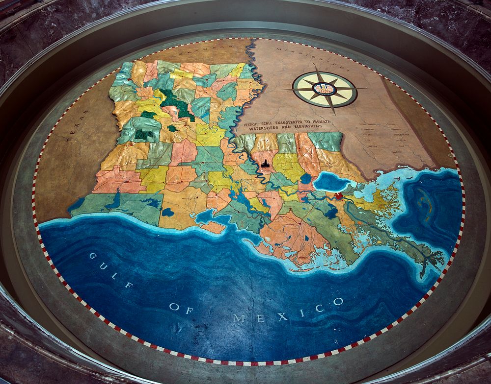                         Sculptor Duncan Ferguson created this raised topographical map of Louisiana, is located three feet…