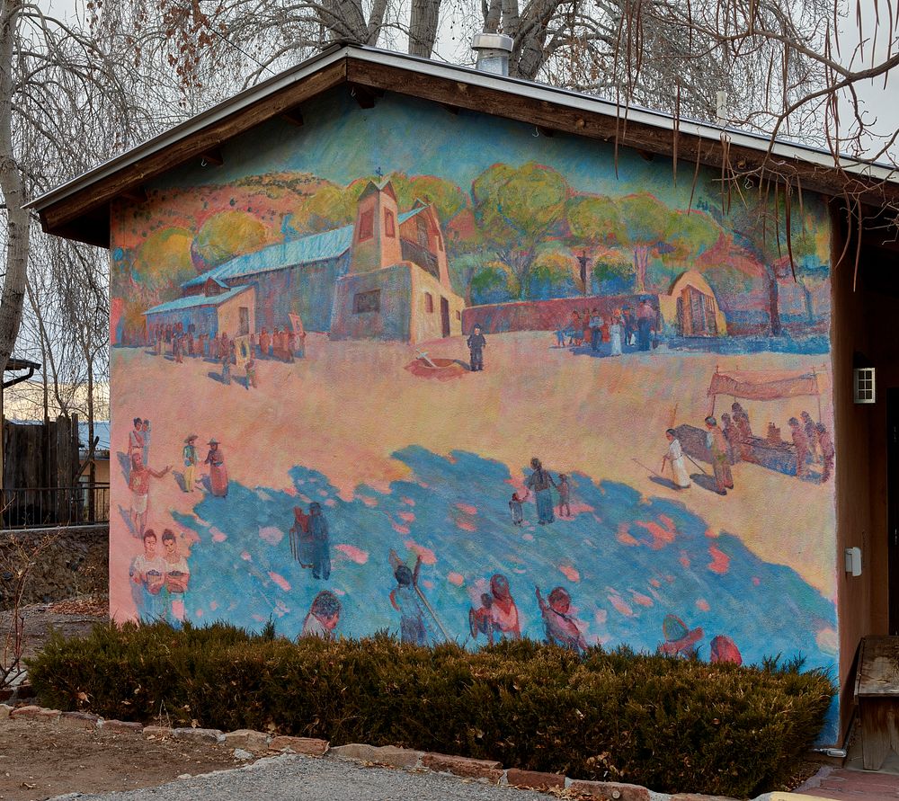                        A colorful mural depicting the El Santuario de Chimayo, a humble but incredibly popular shrine in…