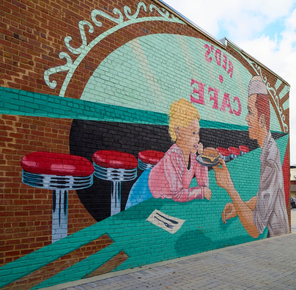                         Artists Seth Bishop and Ben Harrison of Asheville, North Carolina, created this "Red's Cafe" mural…