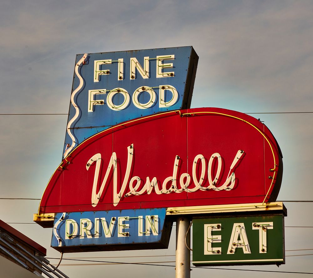                         The "EAT" message is simple at Wendell's fine-food and drive-in restaurant along an eclectic strip…