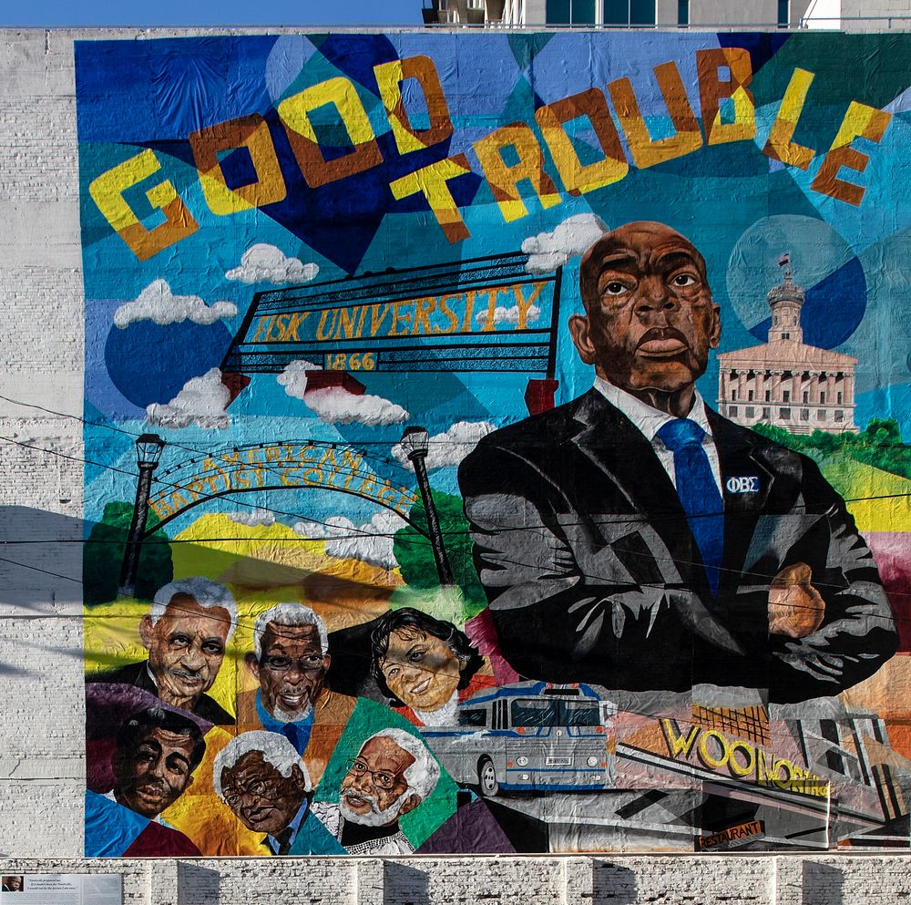                         Artists Michael McBride and Donna Woodley designed and installed this "Good Trouble" mural in…