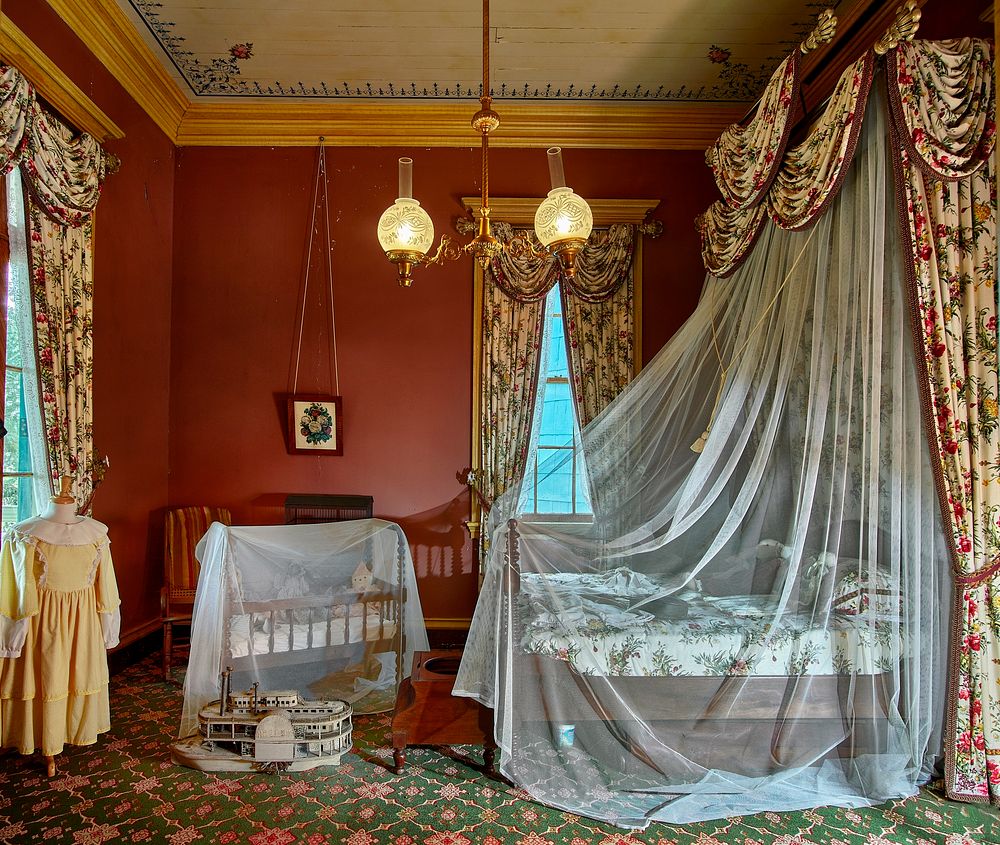                         A richly decorated bedroom at San Francisco Plantation house, built in the 1850s on land now (as of…