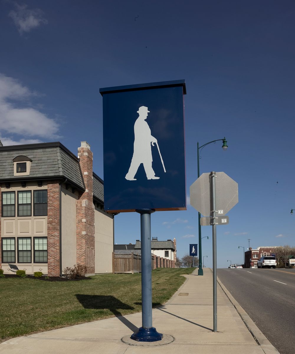                         These flags, showing the profile of a man out for a stroll with his walking stick, can be seen…