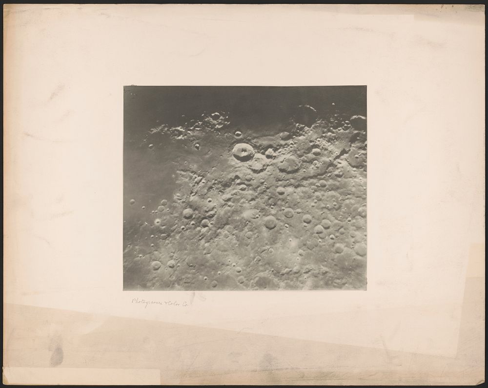 [Image showing a quarter of a celestial body, showing craters]