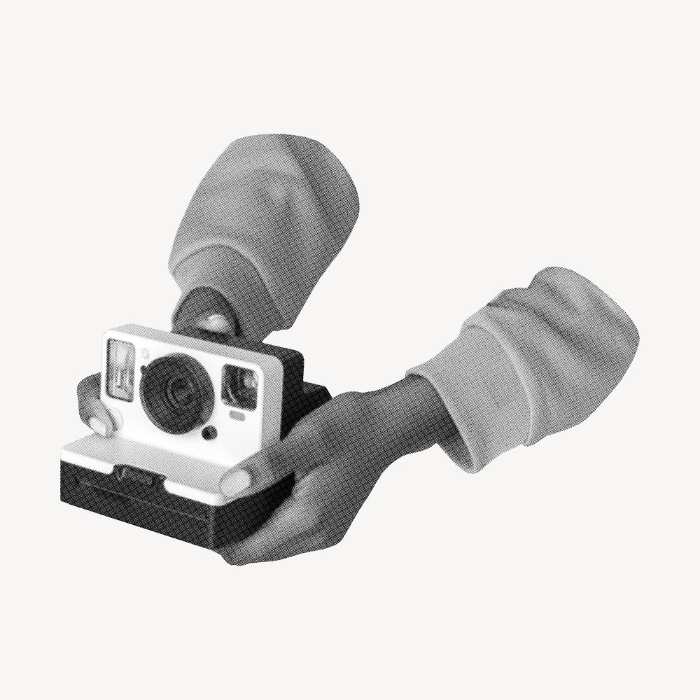 Hand holding instant film camera