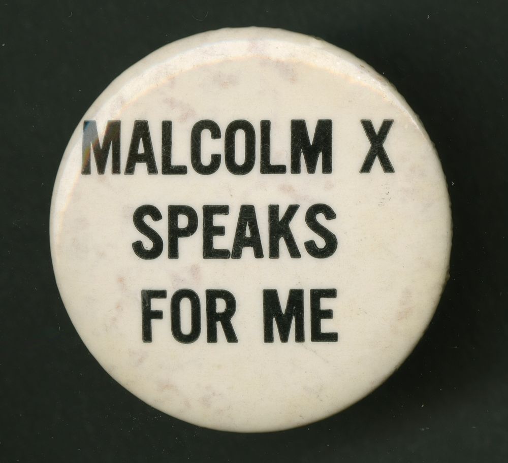 Pinback button which reads "Malcolm X Speaks For Me"