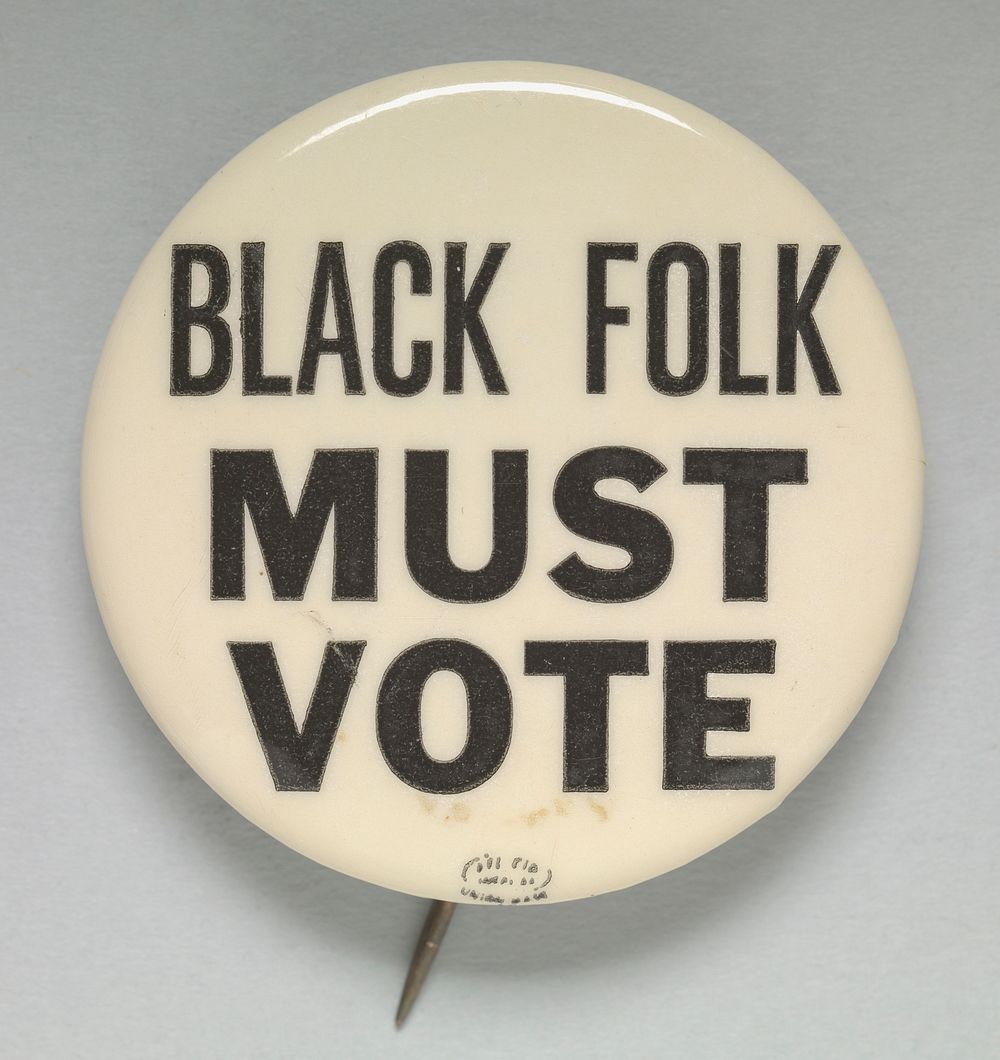 Pinback button reading “Black Folk Must Vote”