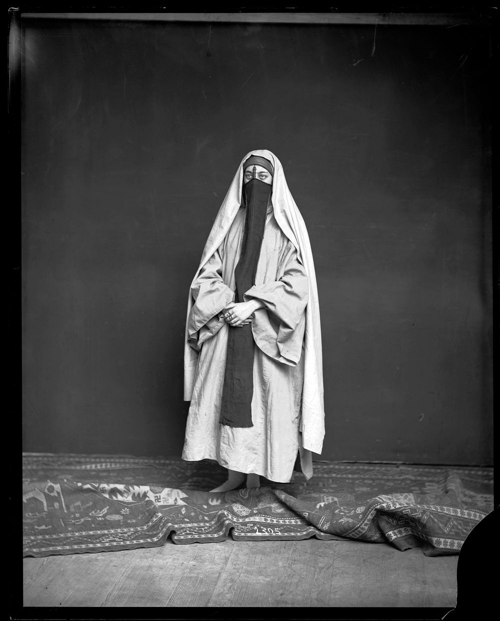 Unidentified Female Models Traditional Middle Eastern Costume with Yashmak (Veil)