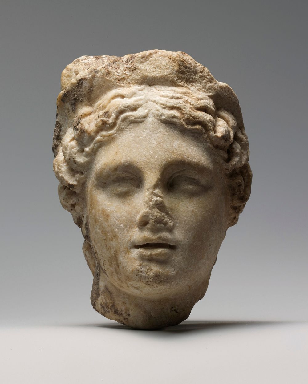 Marble head of a woman wearing a diadem