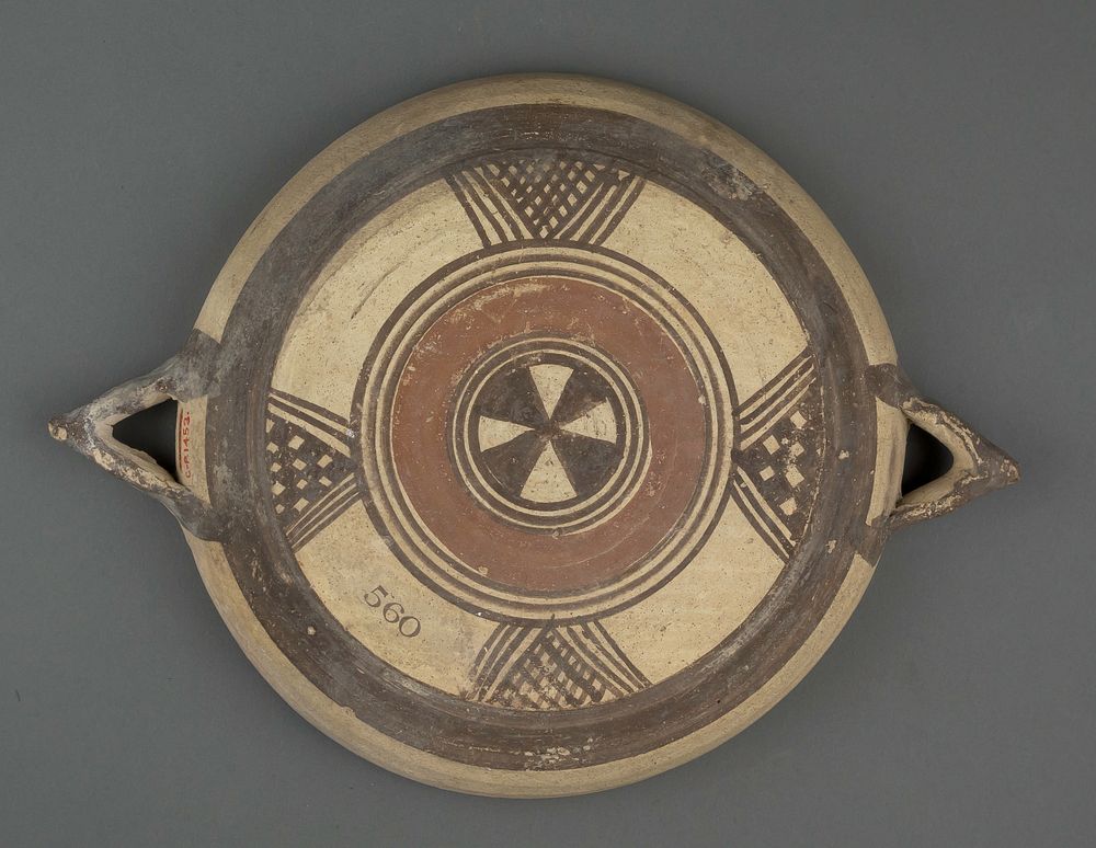 Terracotta plate with horned handles