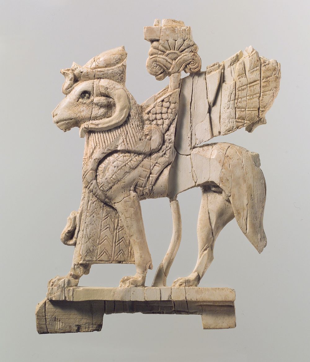 Openwork furniture plaque with ram-headed sphinx, Assyrian