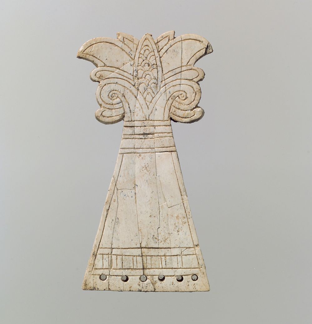 Incised horse frontlet carved into the shape of a flowering, volute palmette tree