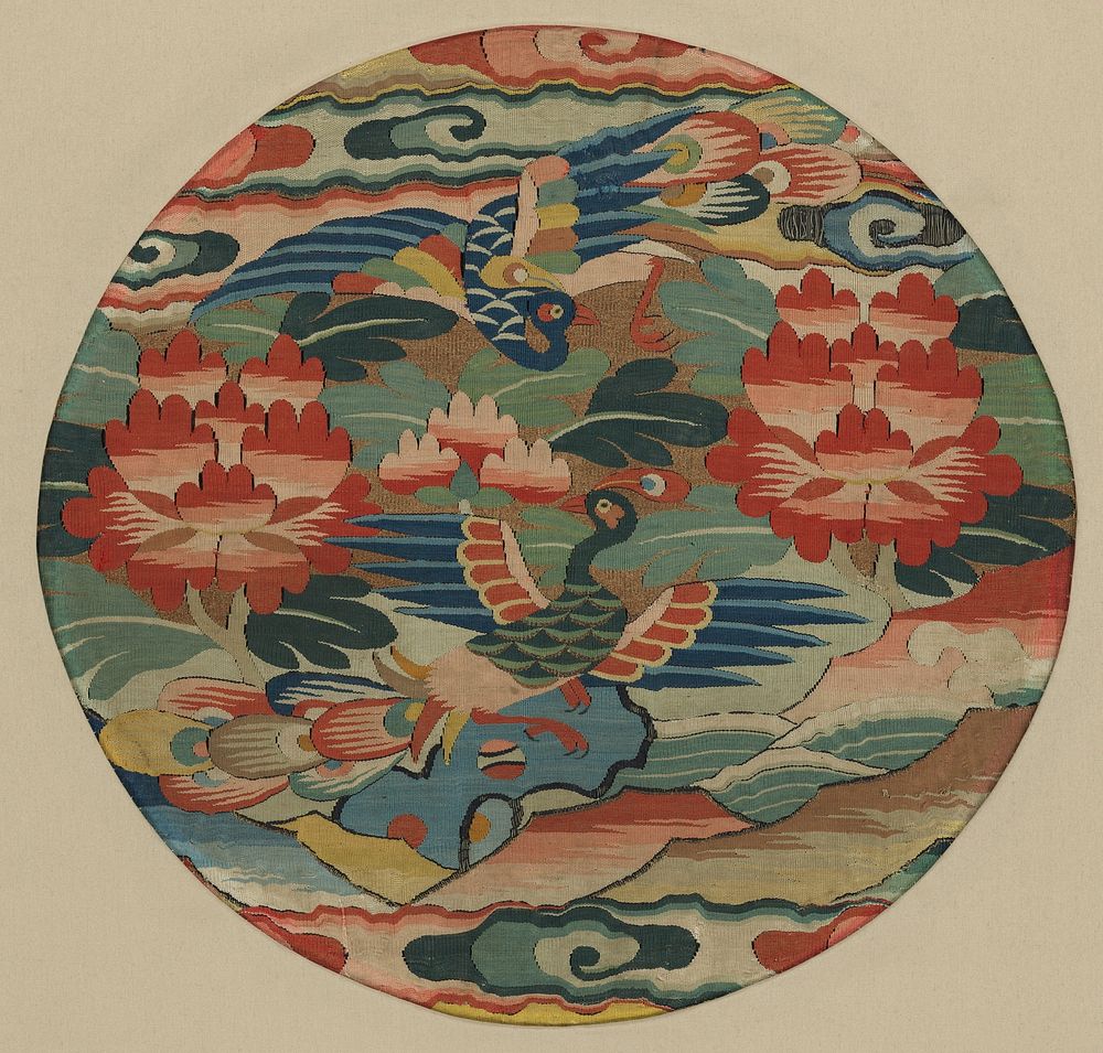 Medallion with two peacocks
