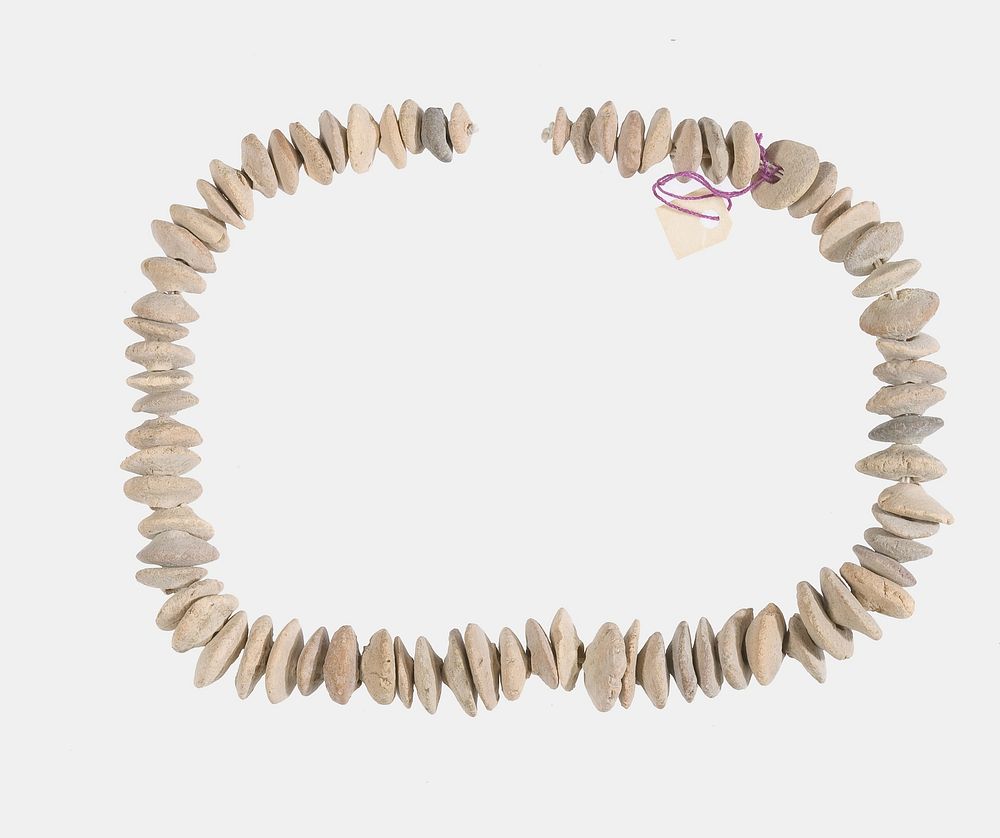 Necklace of  white lenticular beads