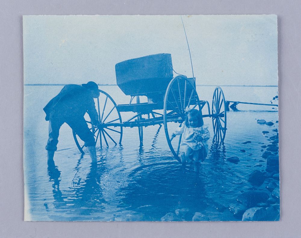 Untitled (Man, Small Girl, and Buggy in Lake) (c.1895) photography in high resolution. 