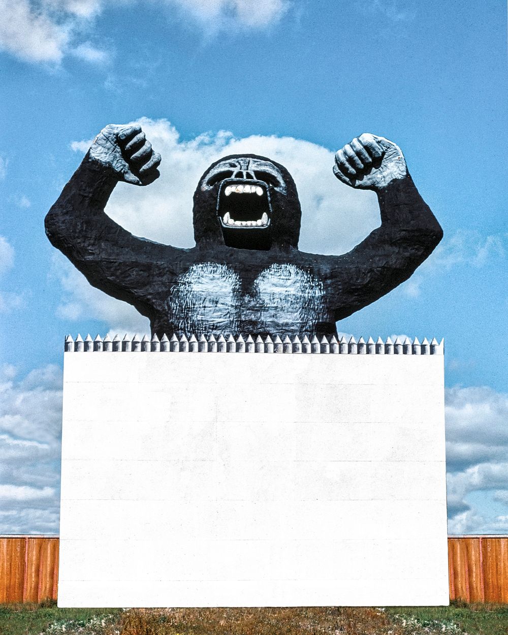 Blank billboard psd mockup with gorilla, remixed from artworks by John Margolies