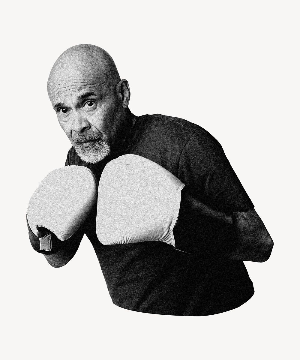 Mature man wearing boxing gloves