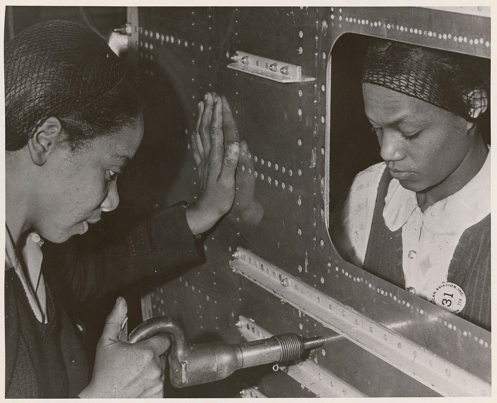 Evelyn T. Gray, Riveter and Pearlyne Smiley, Bucker, Complete a Job on Center Section of a Bomber. Unrestricted. Original…