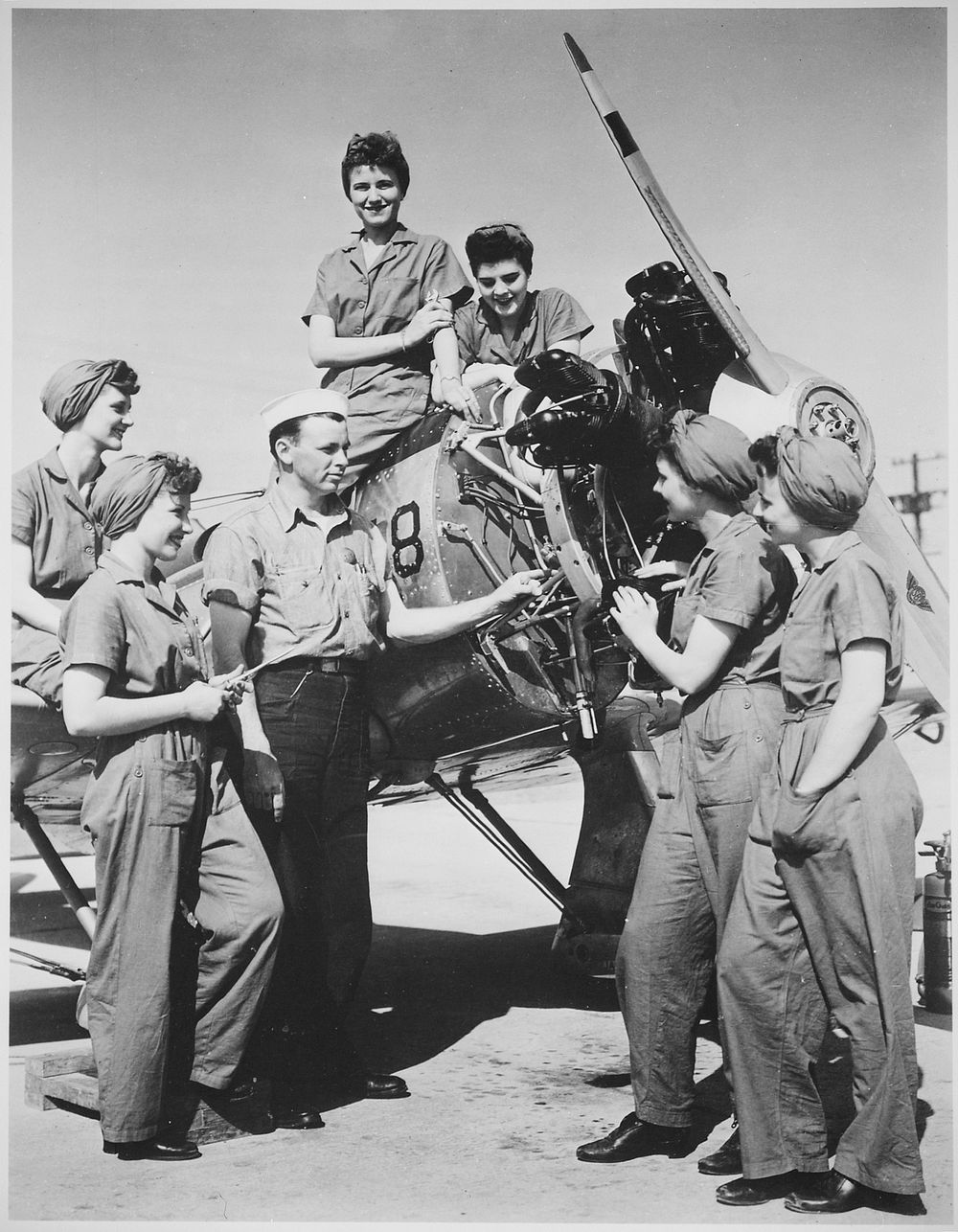 A Group of Women Prepare to Take Over Maintenance Responsibilities for Aircraft, 1940-1945. Original public domain image…