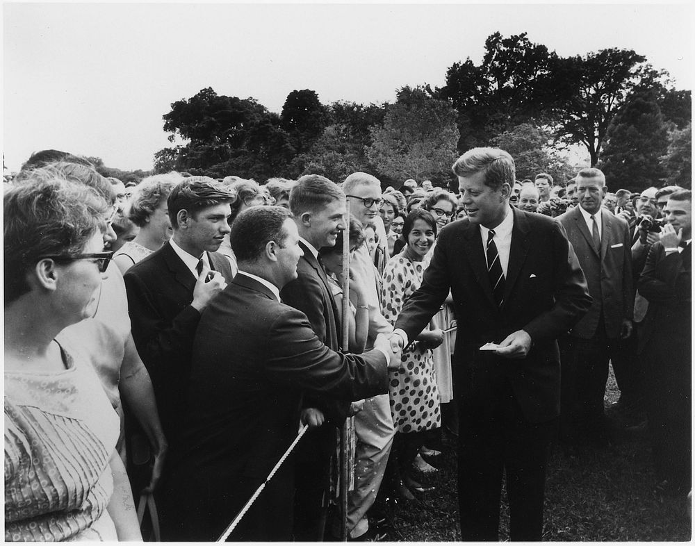 President Kennedy Greets Peace Corps Volunteers on the White House South Lawn. Original public domain image from Flickr