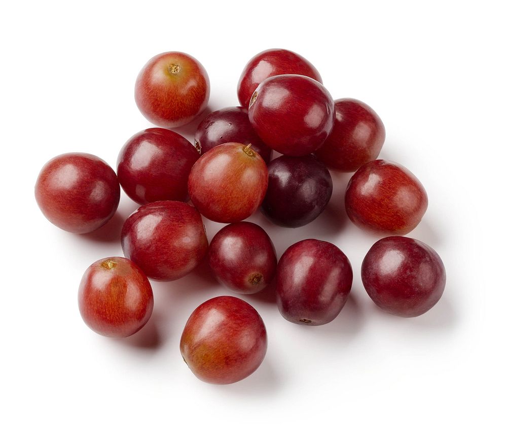 Whole red grapes on white background. Original public domain image from Flickr