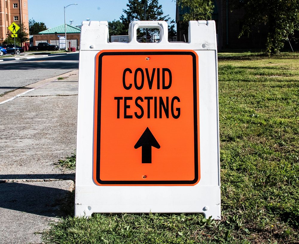 COVID-19 testing, pavement sign board. Original public domain image from Flickr