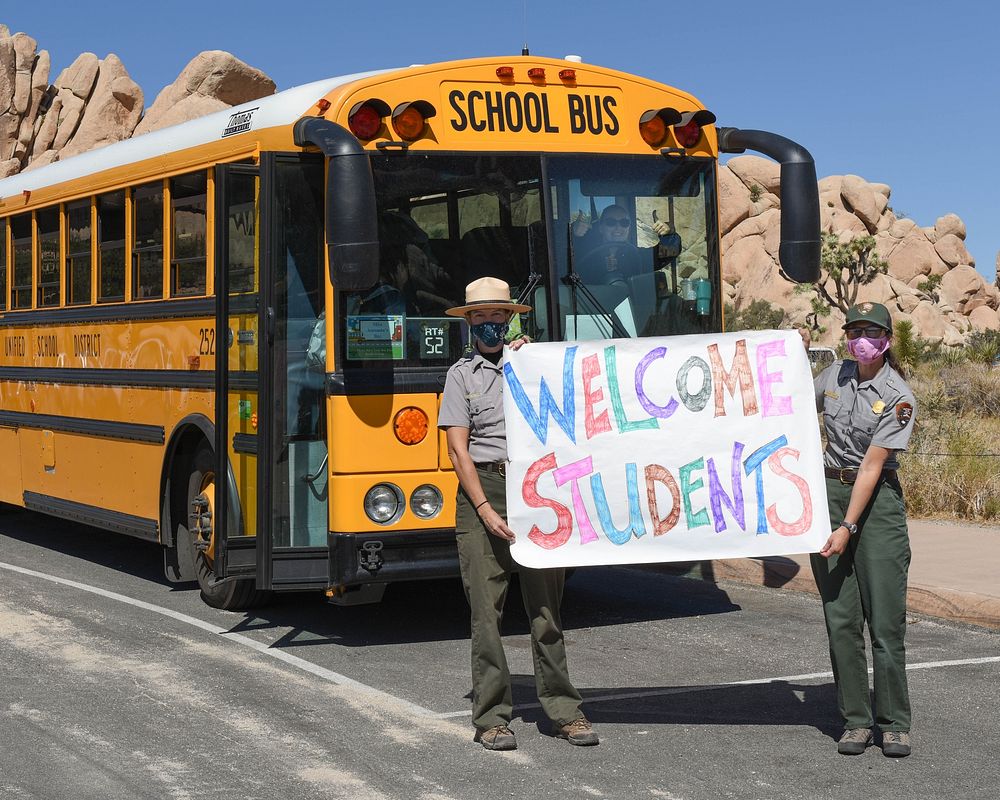 Education Rangers welcome students to the park. Original public domain image from Flickr