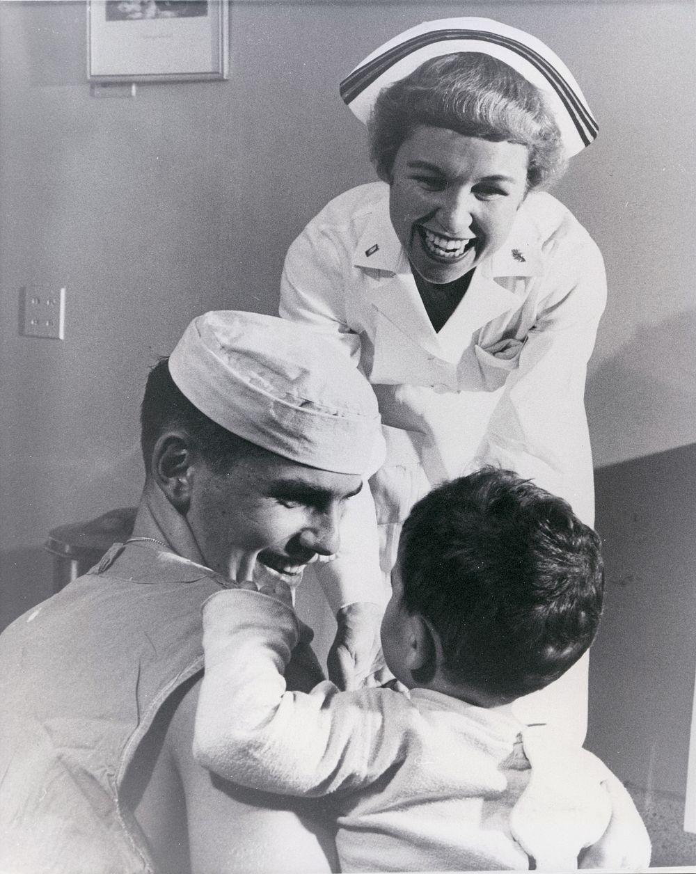 Navy Nurse Lieutenant Junior Grade Lucille F. Neary, of Emerysville, California and her assistant Hospital Corpsman 3rd…