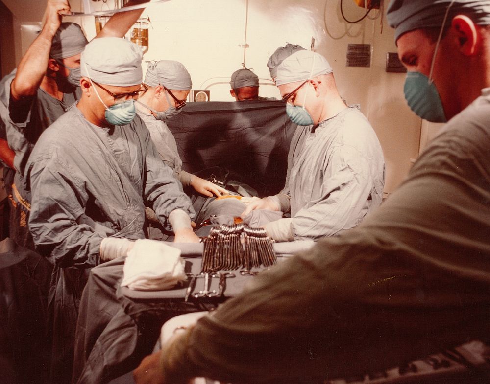 General scene during open heart surgery aboard the hospital ship USS Repose (AH-16). Commander Marion K. Neugebauer, MC…