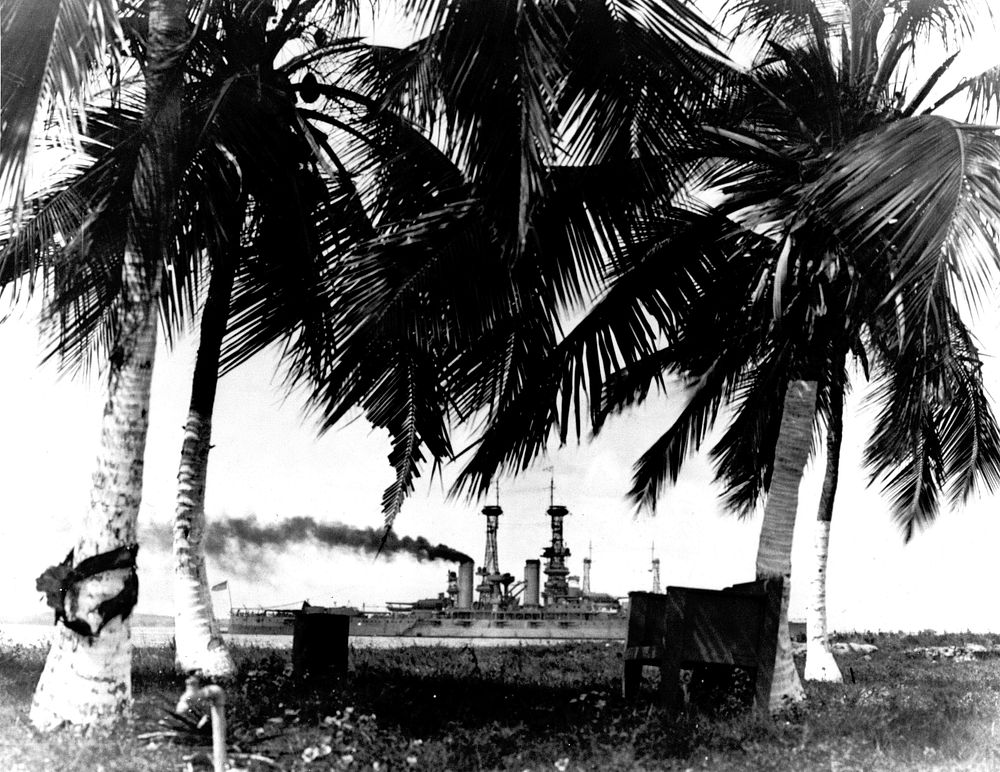 View from shore of Guantanamo Bay, Cuba, with USS North Dakota (BB-29) in the background. Courtesy of ChPhm Gustave Maurer…