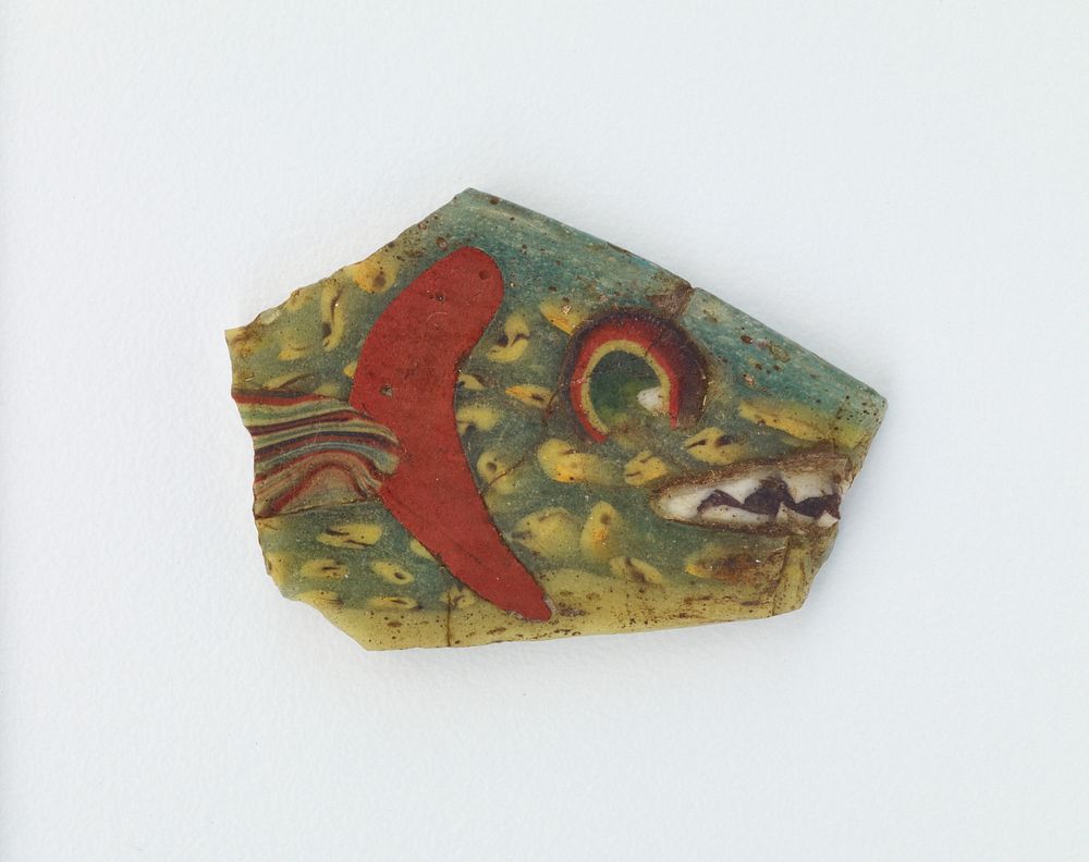 Fragment of an inlay with fish design