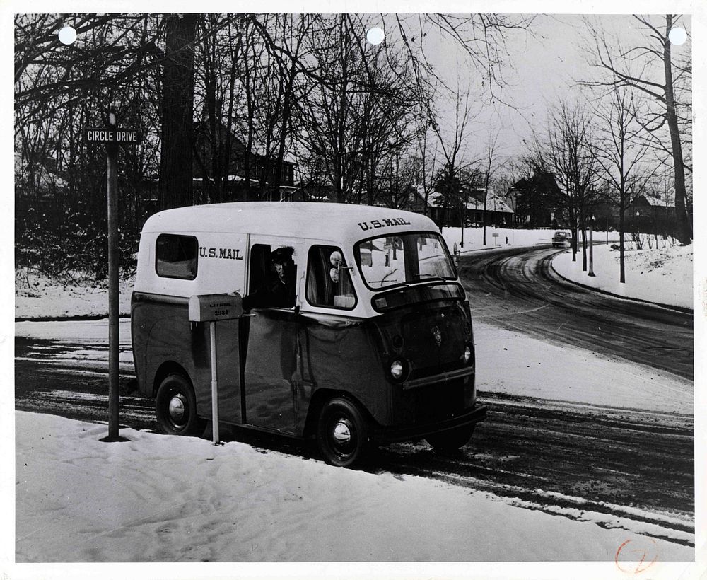 Photograph of mail van in the snow
