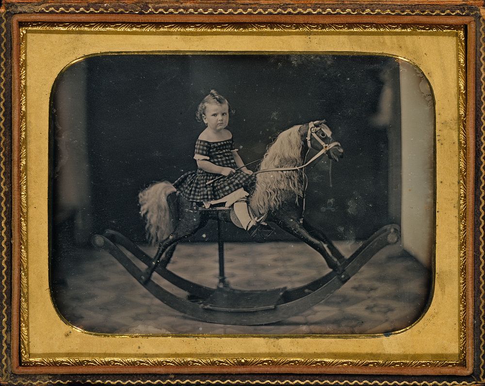 Child on a Rocking Horse