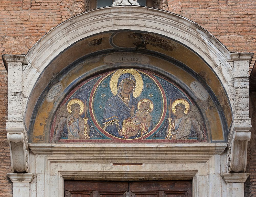 Mosaic of the Madonna with Child, pediment of the side entrance of the church Santa Maria in Aracoeli, Rome, Italy.