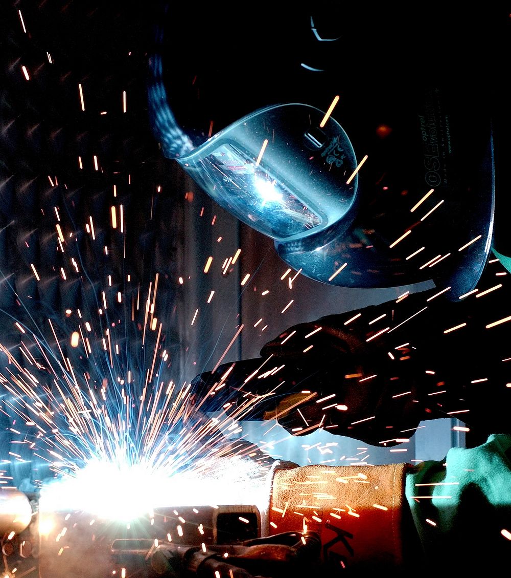 A man gas metal arc welding (MIG).