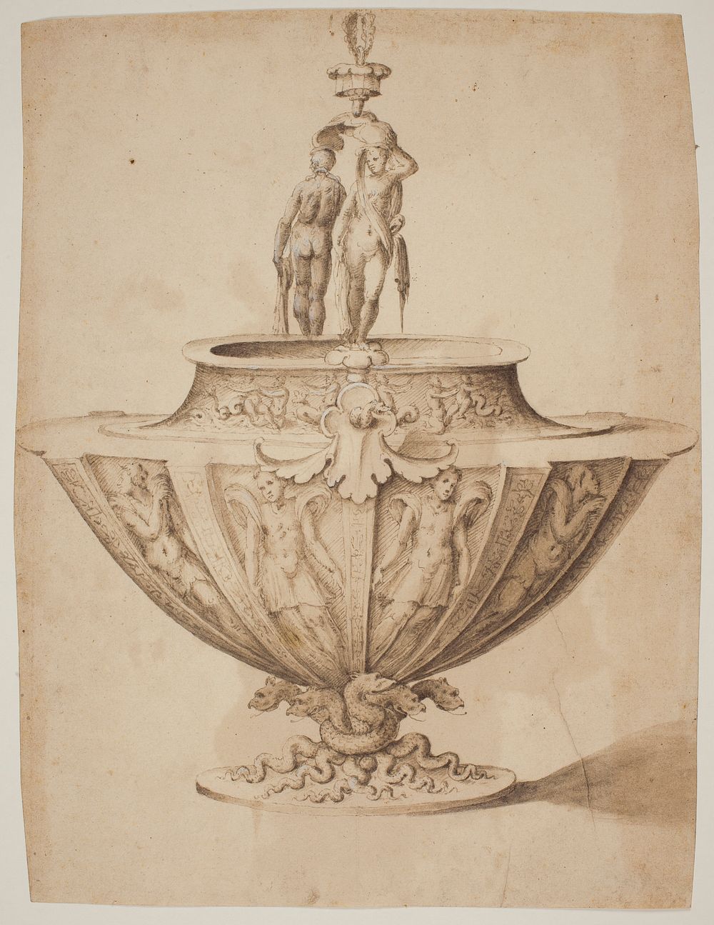 A magnificent bowl with figures and marine scenes on a base encircled by snakes by Giulio Romano
