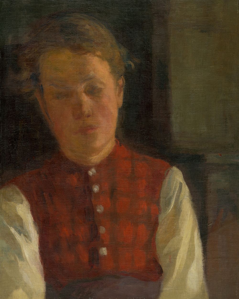 A woman in a red checkered vest