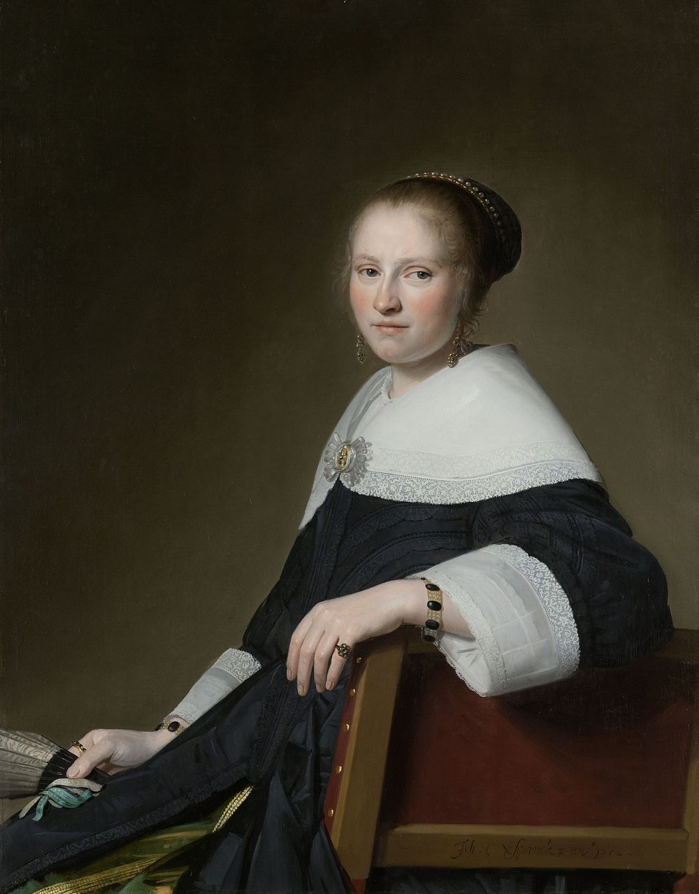Portrait of Maria van Strijp (1627-1707), wife of Eduard Wallis. At knee-length, sitting on a chair, facing left, her face…