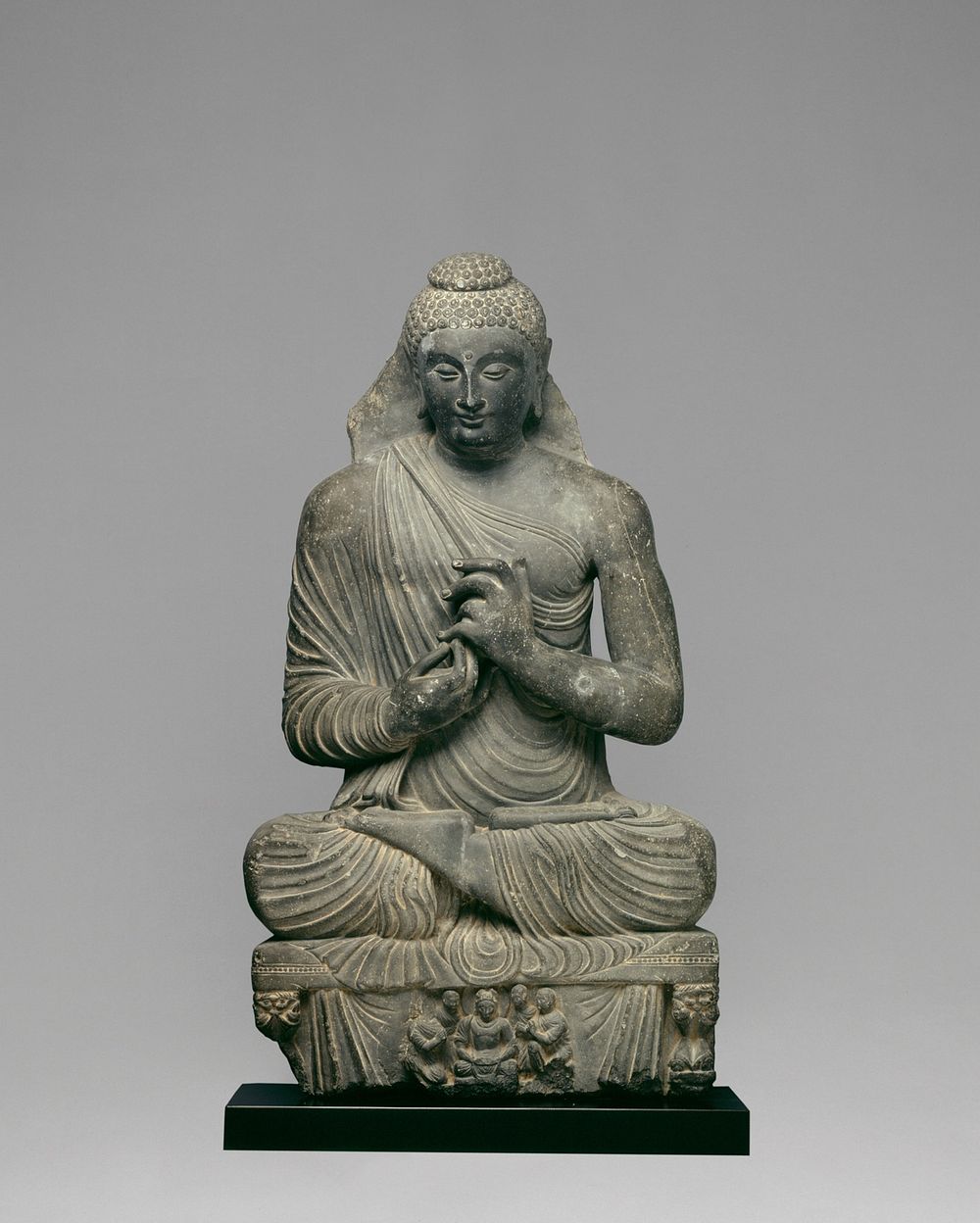 Seated Buddha with Hands in Preaching Gesture (dharmachakrapravartanamudra)